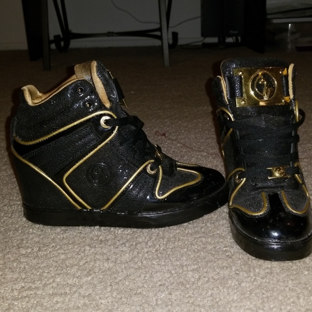 Partially worn high heeled sneakers